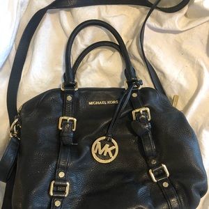 Great used black leather MK purse.